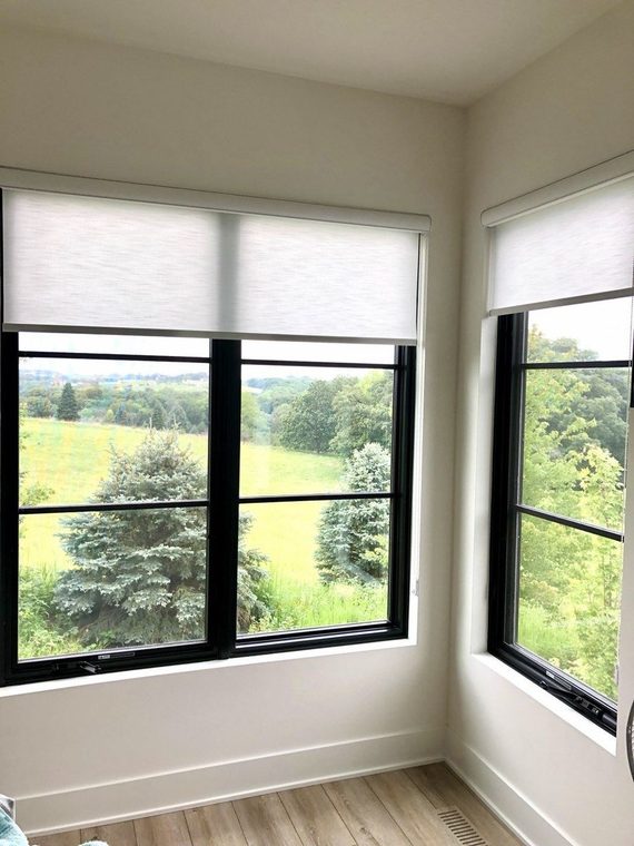 Roller shades on corner windows