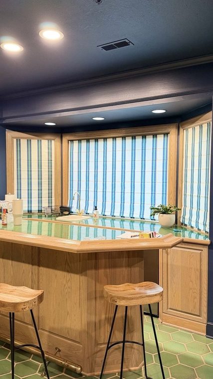 Striped Roman shades in a kitchen