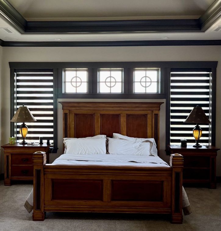 Zebra shades in a bedroom